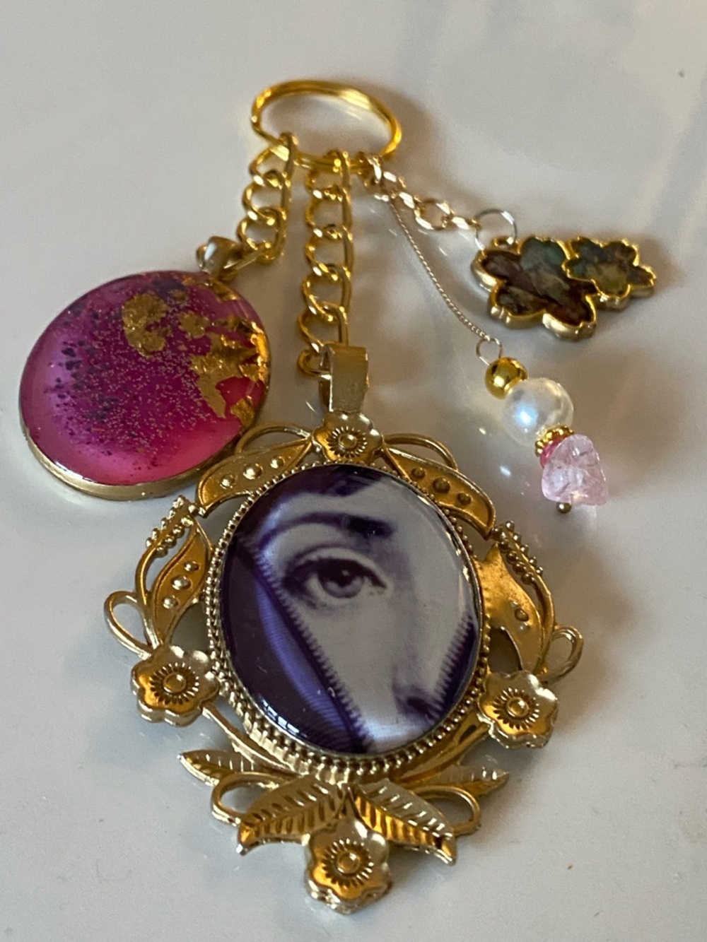 BAG CHARM KEYCHAIN PURSE ACCESSORIE FORNASETTI EVIL EYE PINK PURPLE FLORAL GOLD - Picture 4 of 6